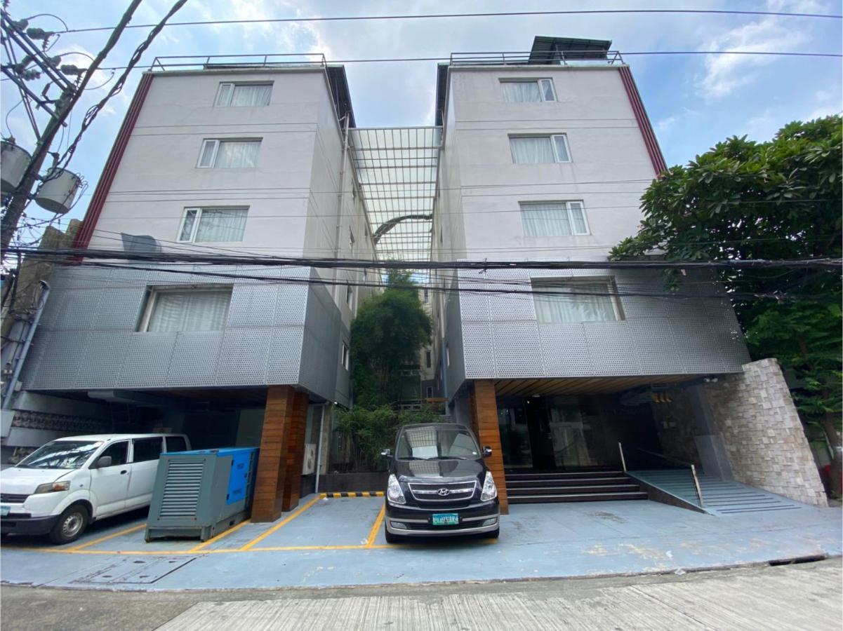 Capital O 820 Guijo Suites Makati Манила Экстерьер фото